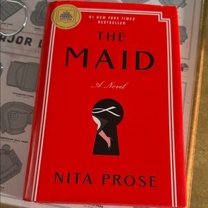 The Maid Novel by Nita Prose - Red Cover